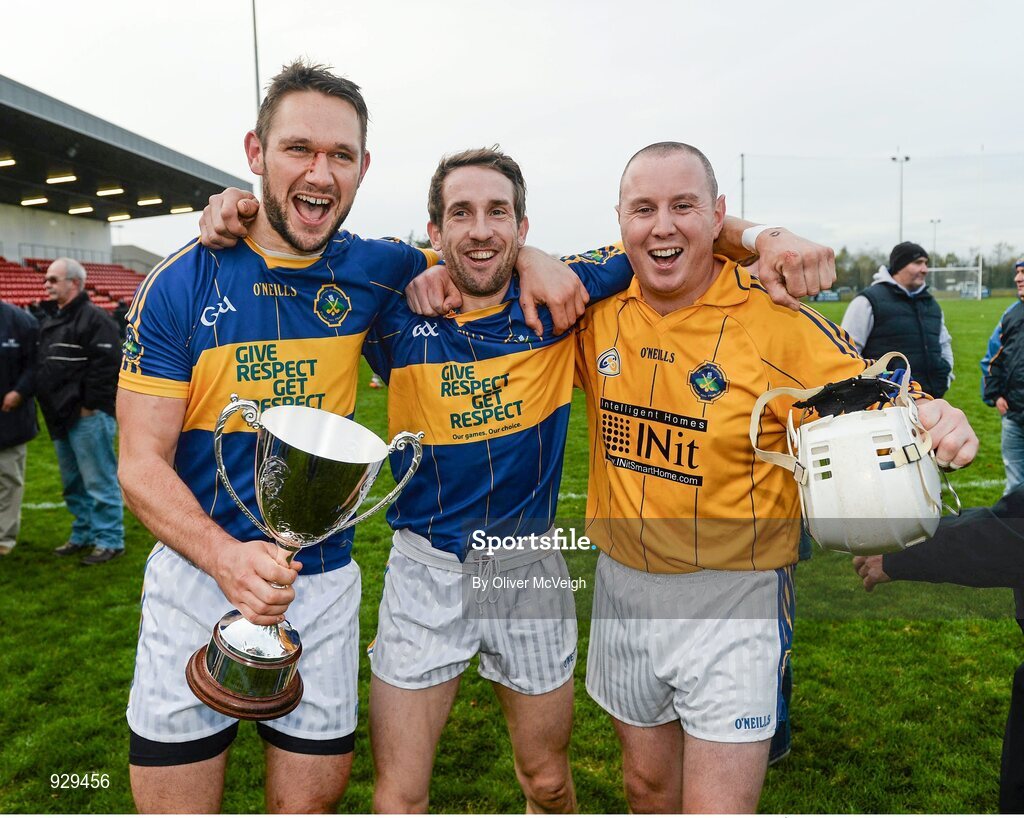 2 November 2014; Conor O'Neill, Andy Savage and Karol Keating, Portaferry, celebrate with the cup after the game. AIB Ulster GAA Hurling Senior Club Championship Final, Portaferry v Cushendall  Ruairi Óg, Owenbeg Centre of Excellence, Dungiven, Derry. Picture credit: Oliver McVeigh / SPORTSFILE