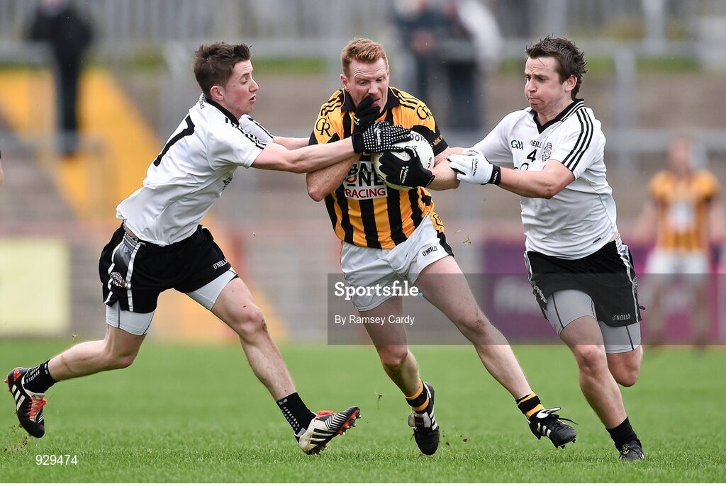 2 November 2014; Michael McNamee, Crossmaglen Rangers, in action against Cormac O'Neill, left, and Stephen Mullan, Omagh St Enda’s. AIB Ulster GAA Football Senior Club Championship, Quarter-Final, Omagh St Enda’s v Crossmaglen Rangers, Healy Park, Omagh, Co. Tyrone. Picture credit: Ramsey Cardy / SPORTSFILE