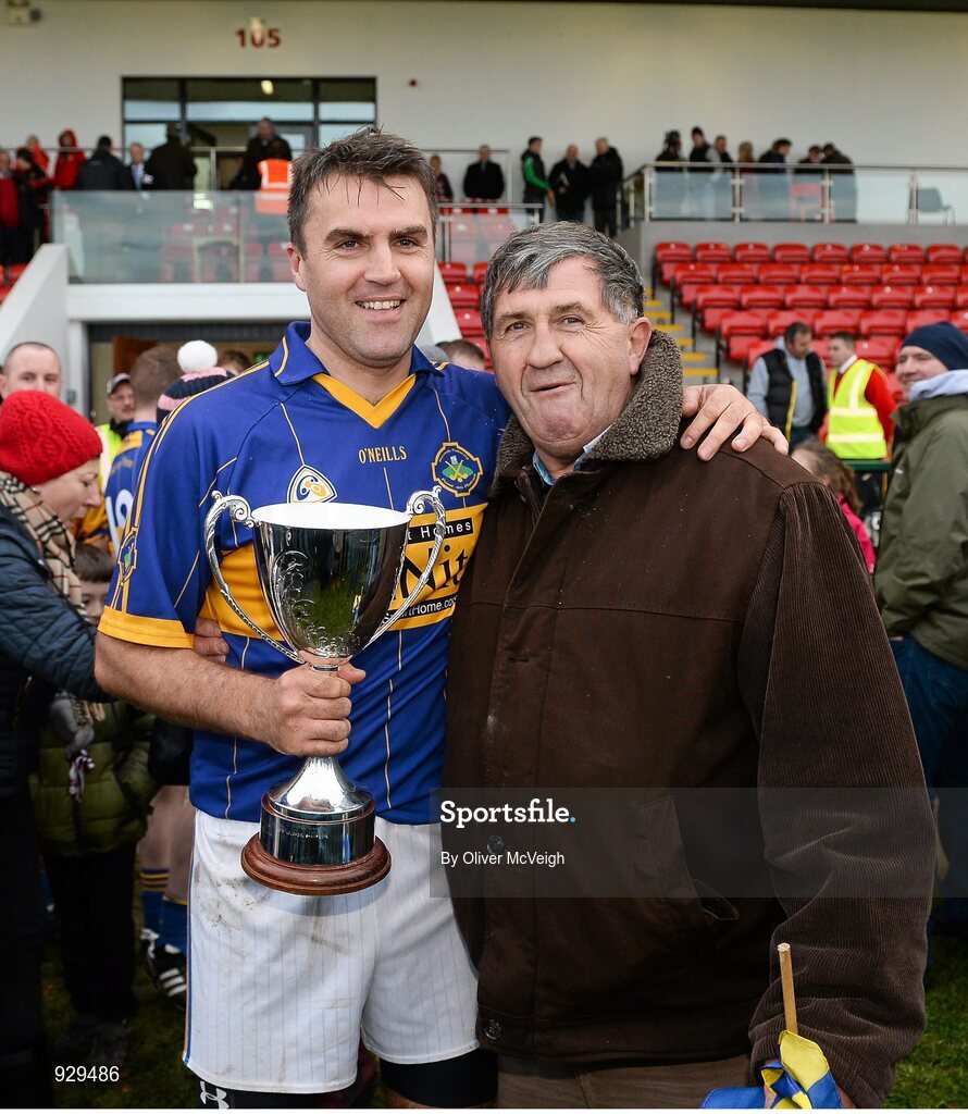 2 November 2014; John Convery, Portaferry Captain, along with his father, John, after the game. AIB Ulster GAA Hurling Senior Club Championship Final, Portaferry v Cushendall  Ruairi Óg, Owenbeg Centre of Excellence, Dungiven, Derry. Picture credit: Oliver McVeigh / SPORTSFILE