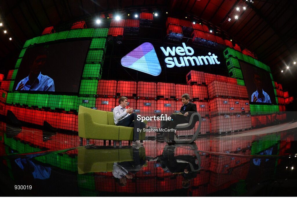 4 November 2014; John Collison, Stripe, in Conversation with David Rowan, Wired, on the centre stage during Day 1 of the 2014 Web Summit in the RDS, Dublin, Ireland. Picture credit: Stephen McCarthy / SPORTSFILE / Web Summit