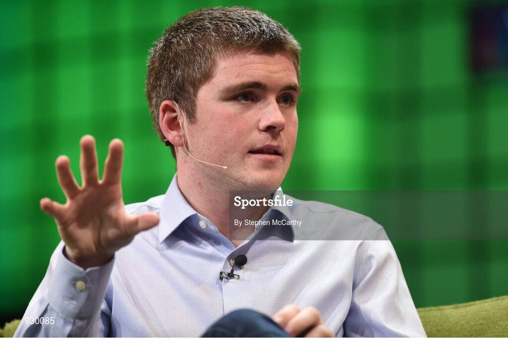 4 November 2014; John Collison, Stripe, in Conversation with David Rowan, Wired, on the centre stage during Day 1 of the 2014 Web Summit in the RDS, Dublin, Ireland. Picture credit: Stephen McCarthy / SPORTSFILE / Web Summit