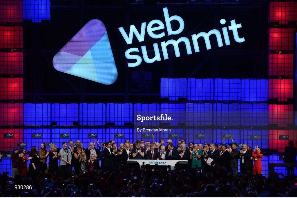 4 November 2014; An Taoiseach Enda Kenny, centre, rings the NASDAQ bell watched by, from left: Paddy Cosgrave, Founder and CEO, Web Summit; Cllr Christy Burke, Lord Major of Dublin; and Adam Kostyál, Head of European Listings, NASDAQ OMX, on the centre stage during Day 1 of the 2014 Web Summit in the RDS, Dublin, Ireland. Picture credit: Brendan Moran / SPORTSFILE / Web Summit