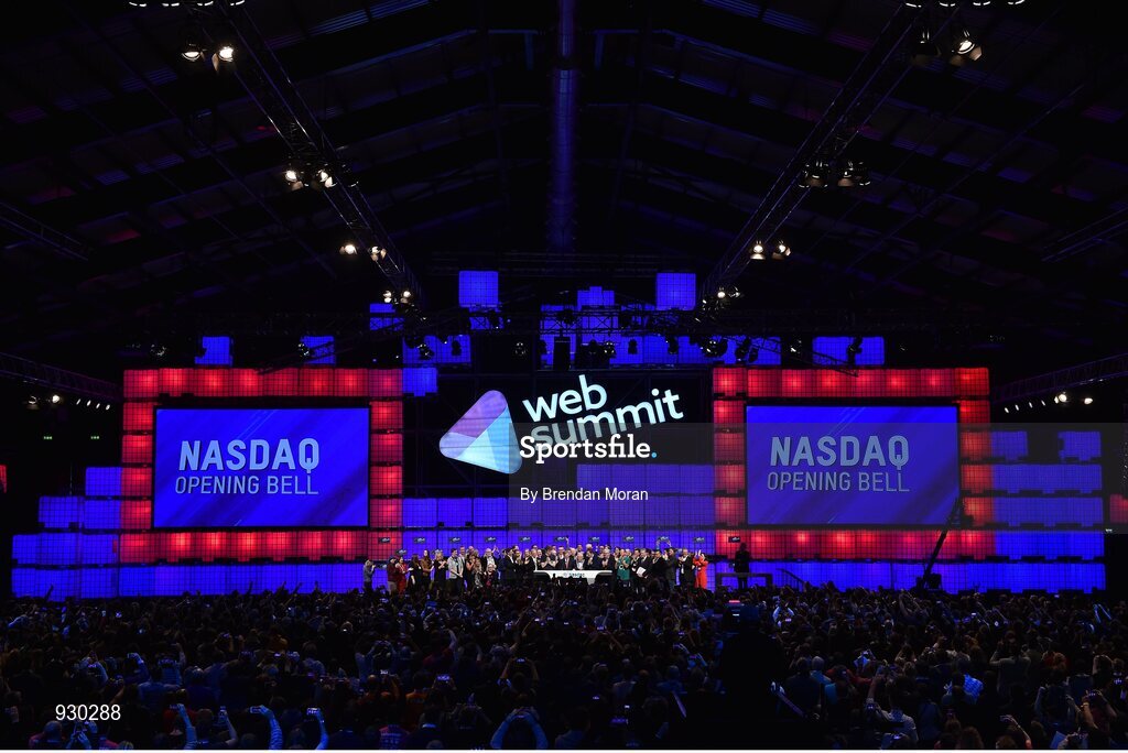4 November 2014; An Taoiseach Enda Kenny, centre, rings the NASDAQ bell watched by, from left: Paddy Cosgrave, Founder and CEO, Web Summit; Cllr Christy Burke, Lord Major of Dublin; and Adam Kostyál, Head of European Listings, NASDAQ OMX, on the centre stage during Day 1 of the 2014 Web Summit in the RDS, Dublin, Ireland. Picture credit: Brendan Moran / SPORTSFILE / Web Summit