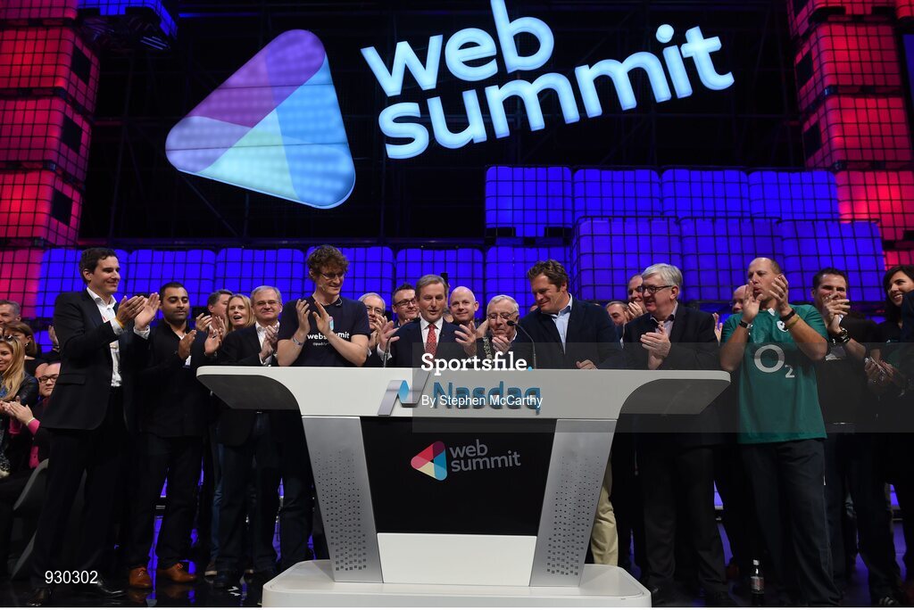 4 November 2014; An Taoiseach Enda Kenny, centre, rings the NASDAQ bell watched by, from left: Paddy Cosgrave, Founder and CEO, Web Summit; Cllr Christy Burke, Lord Major of Dublin; and Adam Kostyál, Head of European Listings, NASDAQ OMX, on the centre stage during Day 1 of the 2014 Web Summit in the RDS, Dublin, Ireland. Picture credit: Stephen McCarthy / SPORTSFILE / Web Summit