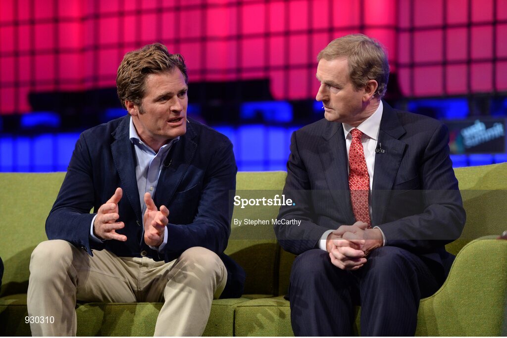 4 November 2014; Adam Kostyál, Head of European Listings, NASDAQ OMX, and An Taoiseach Enda Kenny T.D., right, on the centre stage during Day 1 of the 2014 Web Summit in the RDS, Dublin, Ireland. Picture credit: Stephen McCarthy / SPORTSFILE / Web Summit