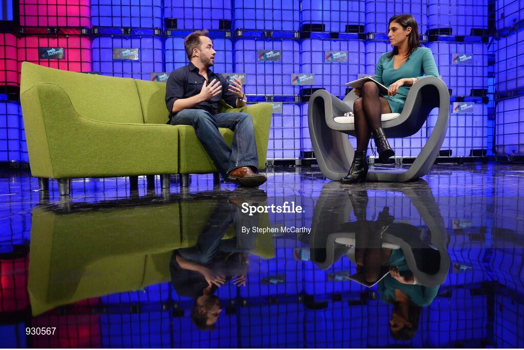 4 November 2014; Drew Houston, Founder, Dropbox, in conversation with Laurie Segall, CNN, on the centre stage during Day 1 of the 2014 Web Summit in the RDS, Dublin, Ireland. Picture credit: Stephen McCarthy / SPORTSFILE / Web Summit