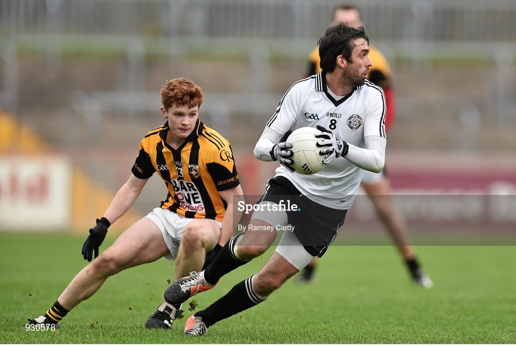 2 November 2014; Joseph McMahon, Omagh St Enda’s, in action against Padraig Studdard, Crossmaglen Rangers. AIB Ulster GAA Football Senior Club Championship, Quarter-Final, Omagh St Enda’s v Crossmaglen Rangers, Healy Park, Omagh, Co. Tyrone. Picture credit: Ramsey Cardy / SPORTSFILE