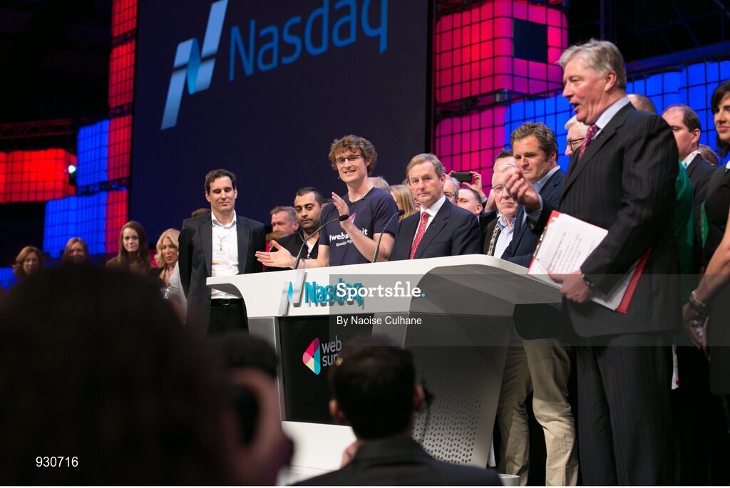 4 November 2014; An Taoiseach Enda Kenny, centre, rings the NASDAQ bell watched by, from left: Paddy Cosgrave, Founder and CEO, Web Summit; Cllr Christy Burke, Lord Major of Dublin; Adam KostyÃ¡l, head of European Listings, NASDAQ OMX; and radio broadcaster Pat Kenny on the centre stage during Day 1 of the 2014 Web Summit in the RDS, Dublin, Ireland. Picture credit: Naoise Culhane / SPORTSFILE / Web Summit