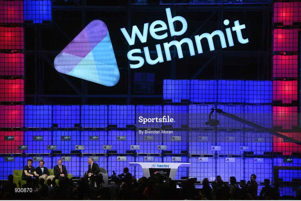 4 November 2014; An Taoiseach Enda Kenny, in conversation with broadcaster Pat Kenny, right, in the company of Paddy Cosgrave, left, Founder and CEO, Web Summit; and Adam Kostyál, Head of European Listings, NASDAQ OMX, on the centre stage during Day 1 of the 2014 Web Summit in the RDS, Dublin, Ireland. Picture credit: Brendan Moran / SPORTSFILE / Web Summit
