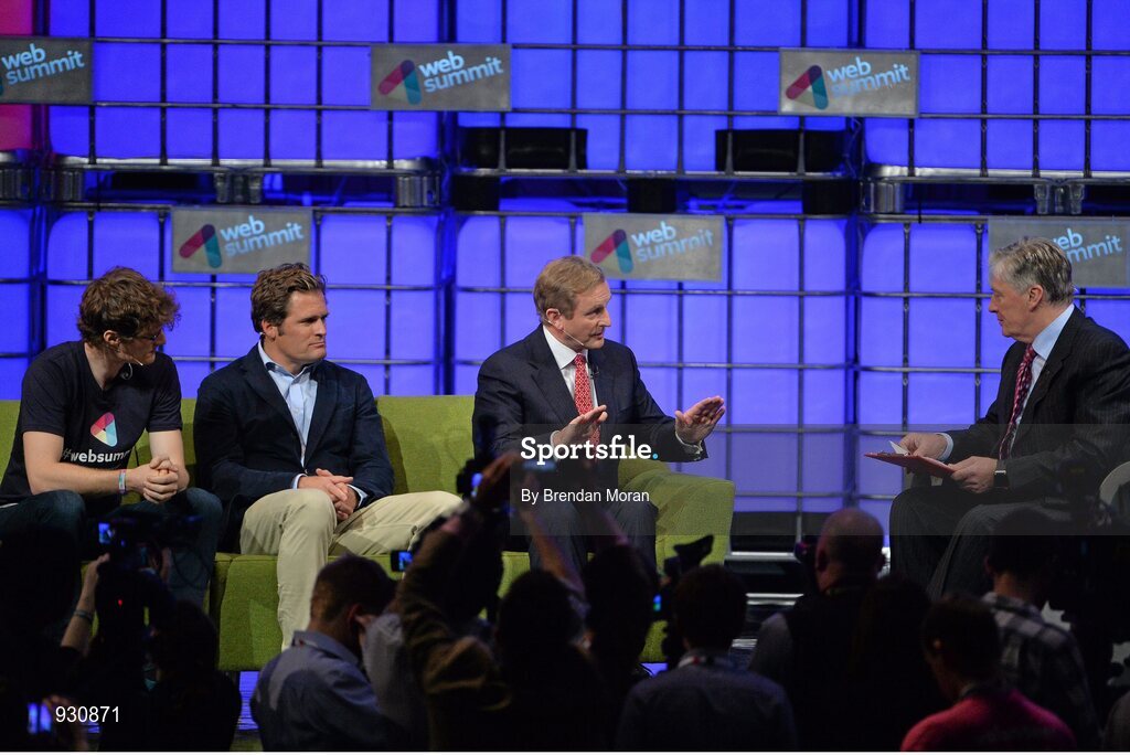 4 November 2014; An Taoiseach Enda Kenny, in conversation with broadcaster Pat Kenny, right, in the company of Paddy Cosgrave, left, Founder and CEO, Web Summit; and Adam Kostyál, Head of European Listings, NASDAQ OMX, on the centre stage during Day 1 of the 2014 Web Summit in the RDS, Dublin, Ireland. Picture credit: Brendan Moran / SPORTSFILE / Web Summit