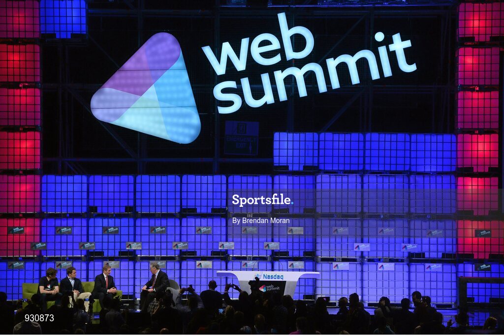4 November 2014; An Taoiseach Enda Kenny, in conversation with broadcaster Pat Kenny, right, in the company of Paddy Cosgrave, left, Founder and CEO, Web Summit; and Adam Kostyál, Head of European Listings, NASDAQ OMX, on the centre stage during Day 1 of the 2014 Web Summit in the RDS, Dublin, Ireland. Picture credit: Brendan Moran / SPORTSFILE / Web Summit