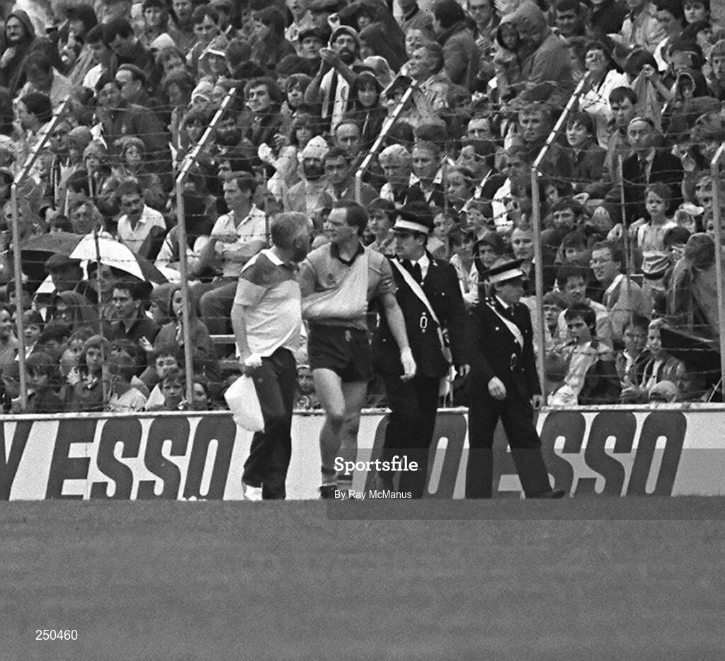 27 July 1986; Dublin's Barney Rock leaves the field with a broken collarbone. Leinster Senior Football Final, Meath v Dublin, Croke Park, Dublin. Picture credit; Ray McManus / SPORTSFILE