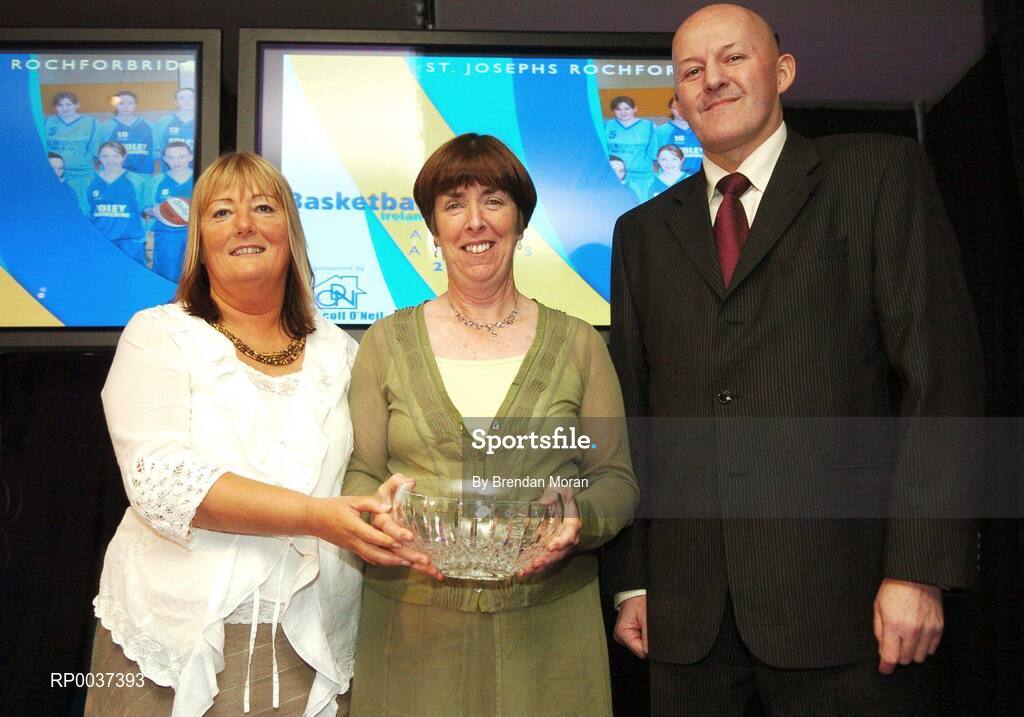 26 May 2007; Nuala Lawlor, St Joseph's, Rochfortbridge, Co. Westmeath, is presented with the Girls School of the Year award by Ardene O'Neill, left, and Tony Colgan, President of Basketball Ireland. Basketball Ireland Annual Awards 2007, Citywest Hotel, Conference, Leisure & Golf Resort, Saggart, Co Dublin. Picture credit: Brendan Moran / SPORTSFILE
