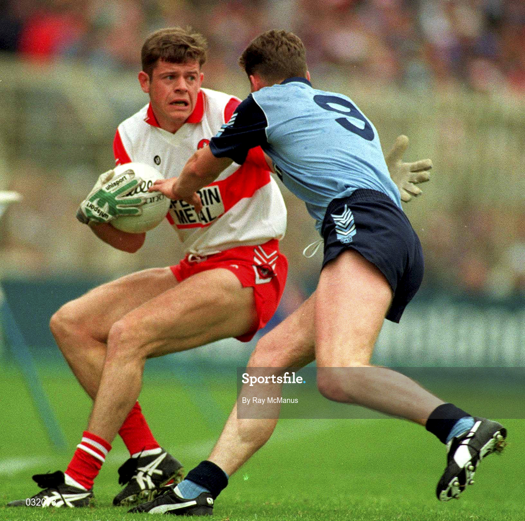 22 August 1993; Anthony Tohill of Derry in action against Paul Bealin of Dublin during the Bank of Ireland All-Ireland Senior Football Championship Semi-Final match between Derry and Dublin at Croke Park in Dublin. Photo by Ray McManus/Sportsfile