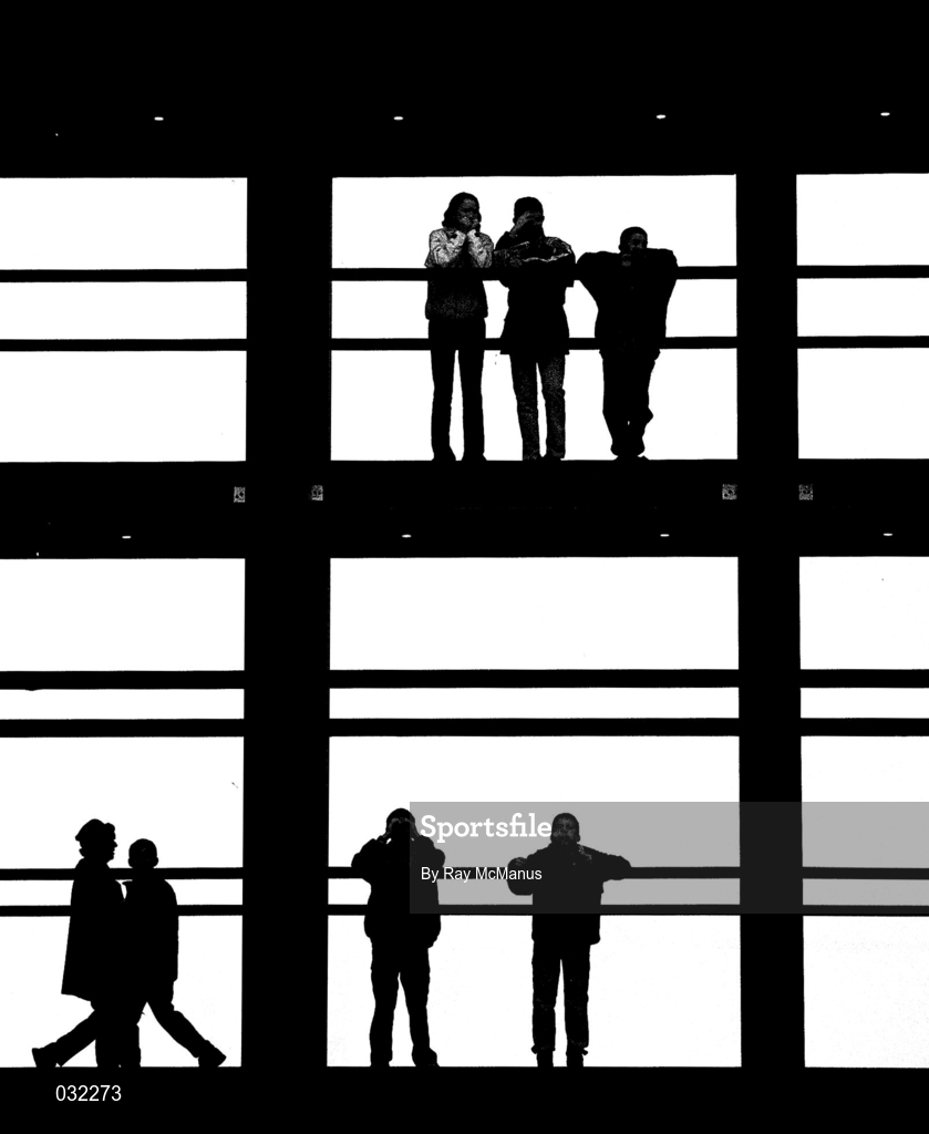 16 January 2000. Racegoers on the bridge linking the old and new stands during racing at Fairyhouse Racecourse in Meath. Photo by Ray McManus/Sportsfile