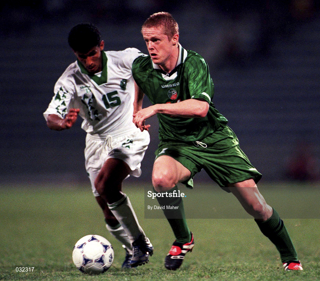 7 April 1999; Damien Duff of Republic of Ireland in action against Fahad Al-Zahrani of Saudi Arabia during the 1999 FIFA World Youth Championship Group C match between Saudi Arabia and Republic of Ireland at Liberty Stadium in Ibadan, Nigeria. Photo by David Maher/Sportsfile