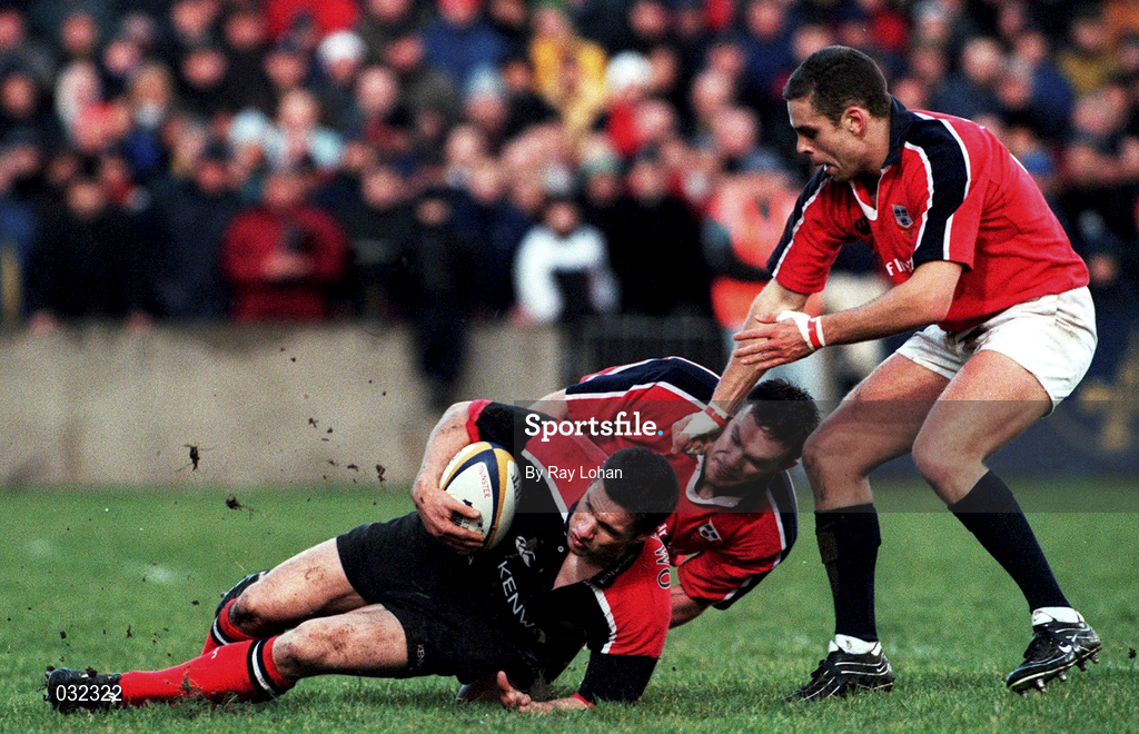 8 January 2000; Darragh O'Mahoney of Saracens is tackled by Munsters John Kelly and Dominic Crotty, right, during the Heineken Cup Pool 4 Round 5 match between Munster and Saracens at Thomond Park in Limerick. Photo by Ray Lohan/Sportsfile