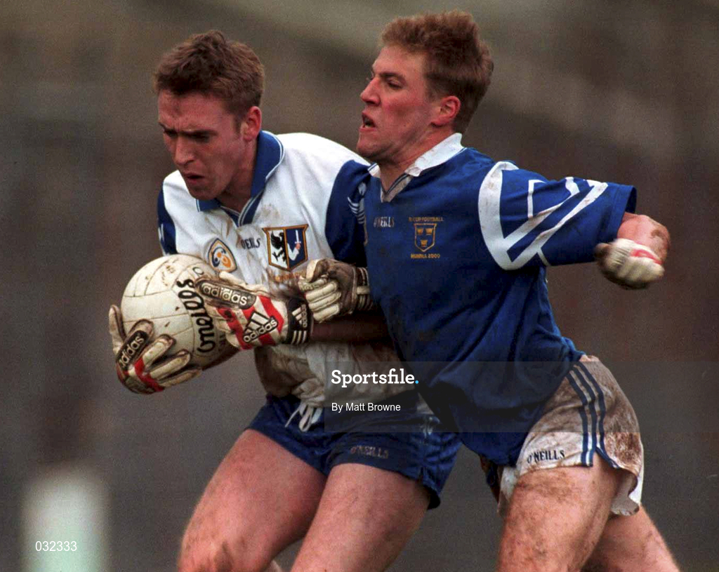 30 January 2000; David Heaney of Connacht is tackled by Anthony Lynch of Munster during the Railway Cup Football Championship Semi-Final between Connacht and Munster at McHale Park in Castlebar, Mayo. Photo by Matt Browne/Sportsfile