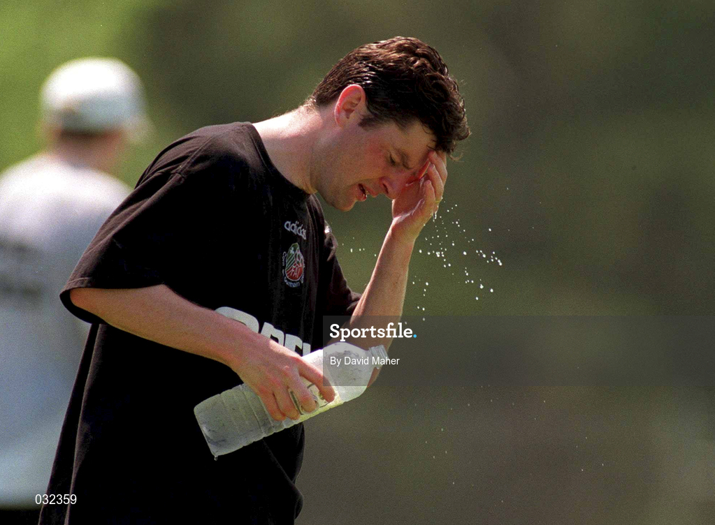21 June 1994; Denis Irwin cools down in the heat during a Republic of Ireland training session at the 1994 FIFA World Cup in USA. Photo by David Maher/Sportsfile