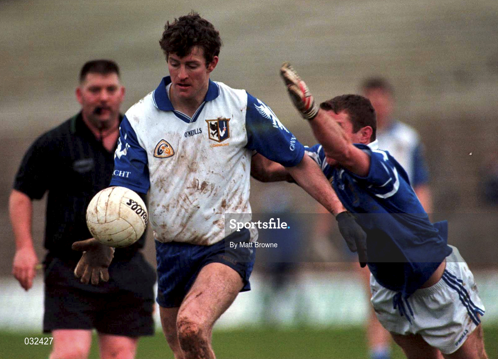30 January 2000; Jarlath Fallon of Connacht is tackled by Owen Sexton of Munster during the Railway Cup Football Championship Semi-Final between Connacht and Munster at McHale Park in Castlebar, Mayo. Photo by Matt Browne/Sportsfile