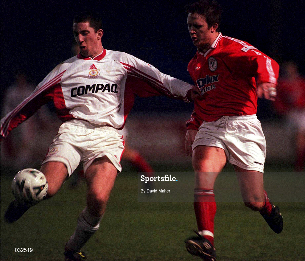 28 January 2000; Kieran Foley of Galway United in action against Dessie Baker of Shelbourne during the Eircom League Premier Division match between Shelbourne and Galway United at Tolka Park in Dublin. Photo by David Maher/Sportsfile