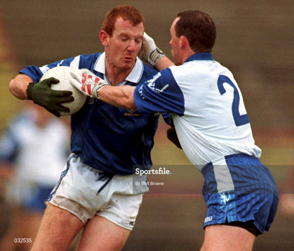 30 January 2000; Liam Hassett of Munster is tackled by Kenneth Mortimer of Connacht during the Railway Cup Football Championship Semi-Final between Connacht and Munster at McHale Park in Castlebar, Mayo. Photo by Matt Browne/Sportsfile