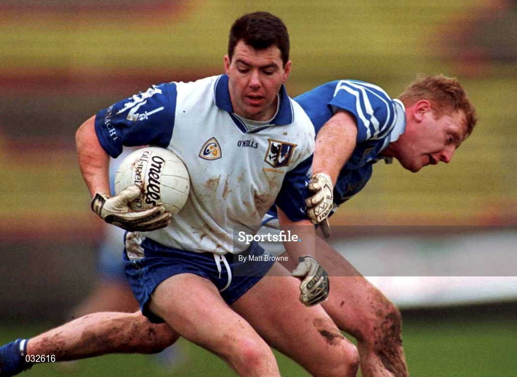 30 January 2000; Sean O'Domhnaill of Connacht is tackled by John Quane of Munster during the Railway Cup Football Championship Semi-Final between Connacht and Munster at McHale Park in Castlebar, Mayo. Photo by Matt Browne/Sportsfile