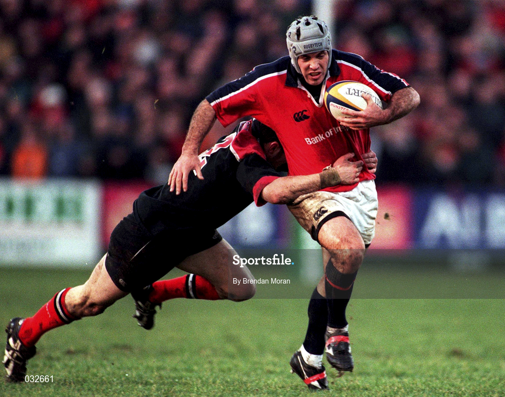 8 January 2000; Mike Mullins of Munster is tackled by Kevin Sorrell of Saracens during the Heineken Cup Pool 4 Round 5 match between Munster and Saracens at Thomond Park in Limerick. Photo by Brendan Moran/Sportsfile