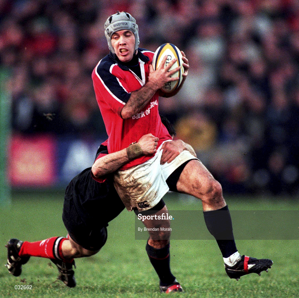 8 January 2000; Mike Mullins of Munster is tackled by Kevin Sorrell of Saracens during the Heineken Cup Pool 4 Round 5 match between Munster and Saracens at Thomond Park in Limerick. Photo by Brendan Moran/Sportsfile