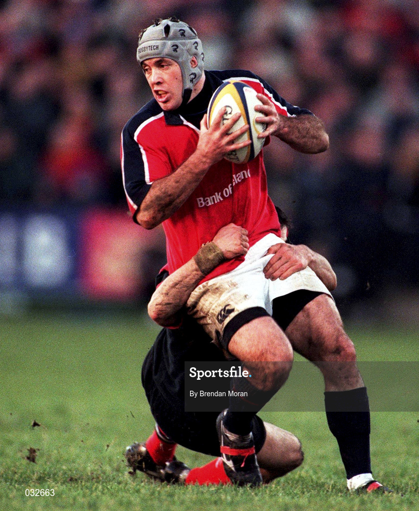 8 January 2000; Mike Mullins of Munster is tackled by Kevin Sorrell of Saracens during the Heineken Cup Pool 4 Round 5 match between Munster and Saracens at Thomond Park in Limerick. Photo by Brendan Moran/Sportsfile