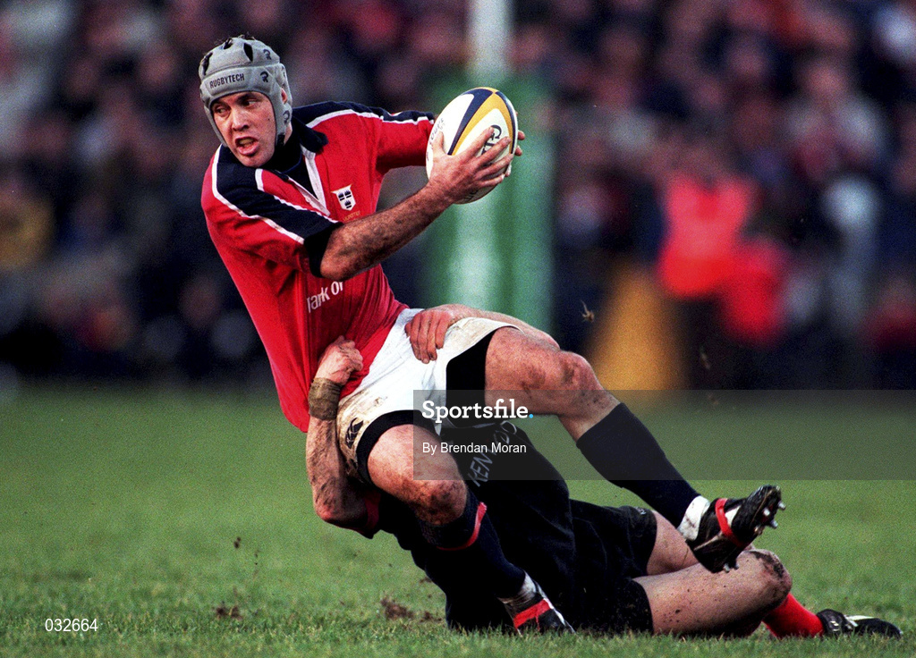 8 January 2000; Mike Mullins of Munster is tackled by Kevin Sorrell of Saracens during the Heineken Cup Pool 4 Round 5 match between Munster and Saracens at Thomond Park in Limerick. Photo by Brendan Moran/Sportsfile