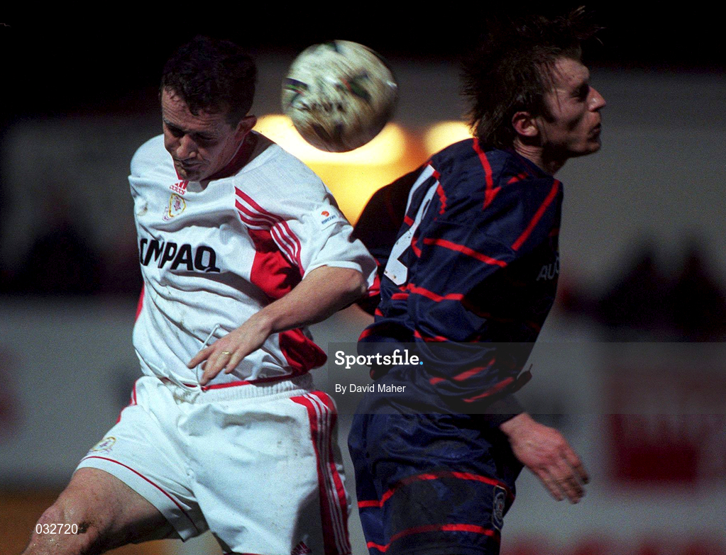 11 January 2000; Ollie Neary of Galway United in action against Trevor Molloy of St Patrick's Athletic during the Harp Larger FAI Cup Second Round Replay match between St Patrick's Athletic and Galway United at Richmond Park in Dublin. Photo by David Maher/Sportsfile
