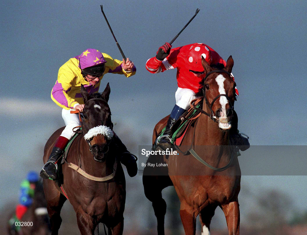 23 January 2000; Florida Pearl, with Paul Carberry up, right, races ahead of Amberleigh House, with Philip Carberry up, to win the Bax Global Handicap Steeplechase at Leopardstown Racecourse in Dublin. Photo by Ray Lohan/Sportsfile