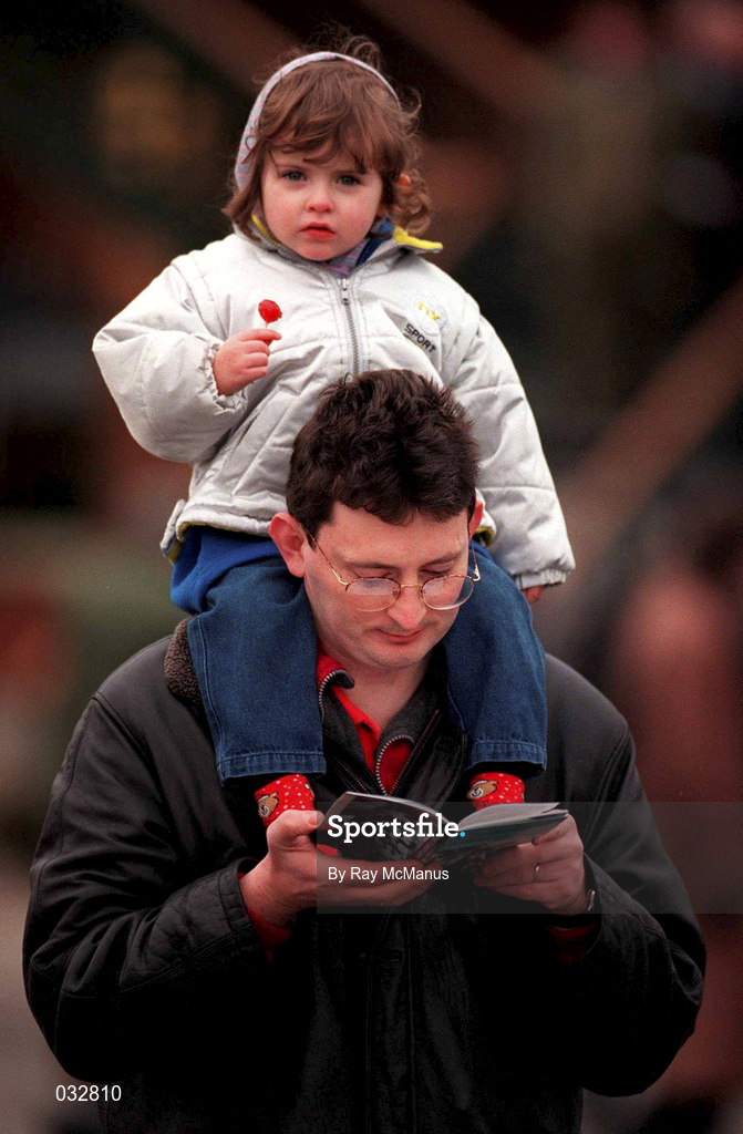 16 January 2000; Robert McGreevey and his two-and-a-half year old daughter Emily, from Blackrock, Dublin, during racing at Fairyhouse Racecourse in Meath. Photo by Ray McManus/Sportsfile