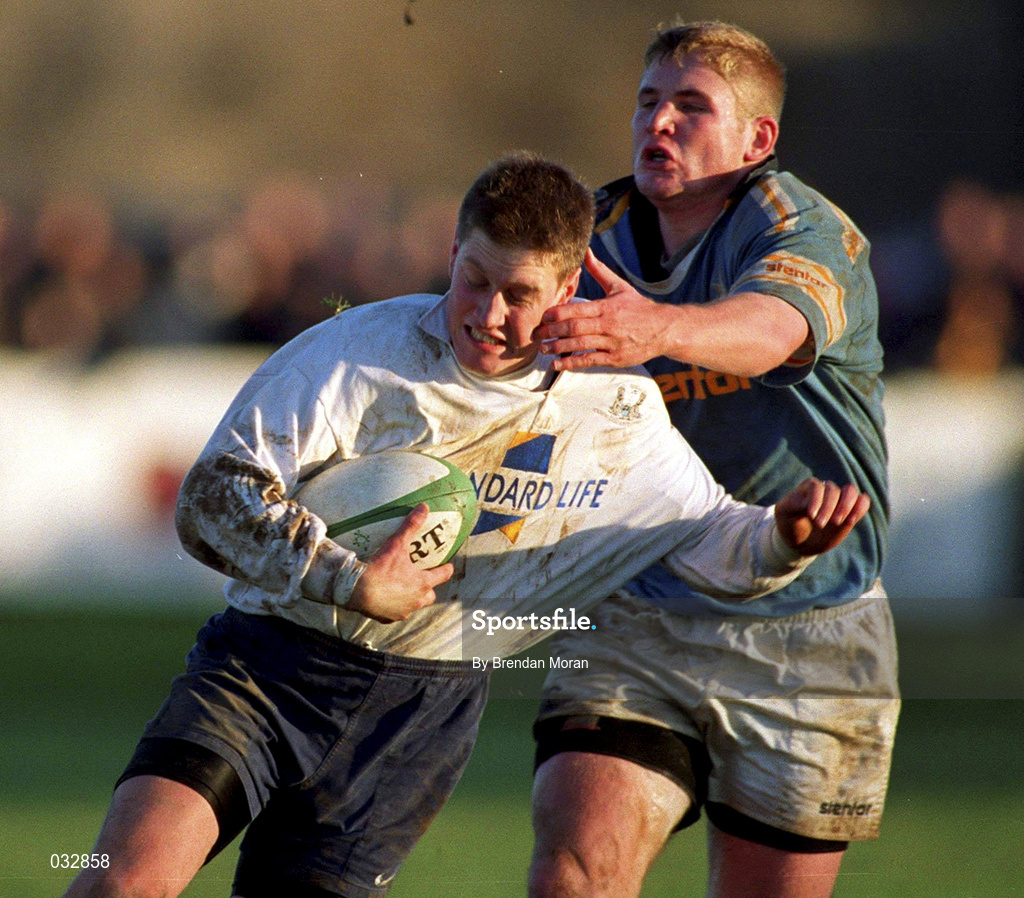 28 December 1999; Ronan O'Gara of Cork Constitution is tackled by Paul Neville of Garryowen during the AIB All-Ireland League Division 1 match between Cork Constitution and Garryowen at Temple Hill in Cork. Photo by Brendan Moran/Sportsfile