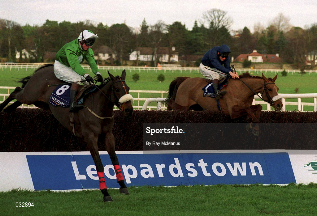 26 December 1999; Slaney Native, with Jason Titley up, 8, jumps the last shead of eventual winner Native Upmanship, with Conor O'Dwyer up, during the Denny Gold Medal Novice Chase at Leopardstown Racecourse in Dublin. Photo by Ray McManus/Sportsfile