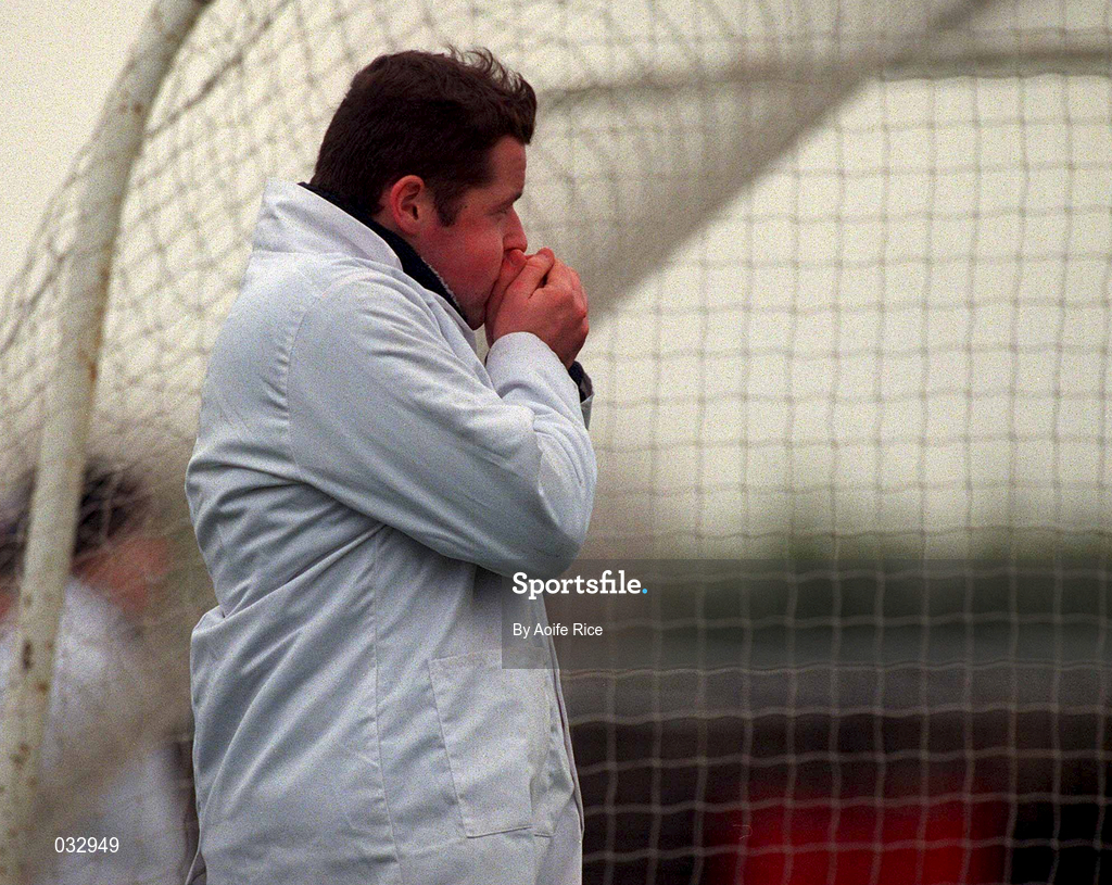 30 January 2000; An umpire tries to keep warm during the Kehoe Cup Quarter-Final match between Meath and Louth at Pairc Naomh Brid in Dundalk, Louth. Photo by Aoife Rice/Sportsfile