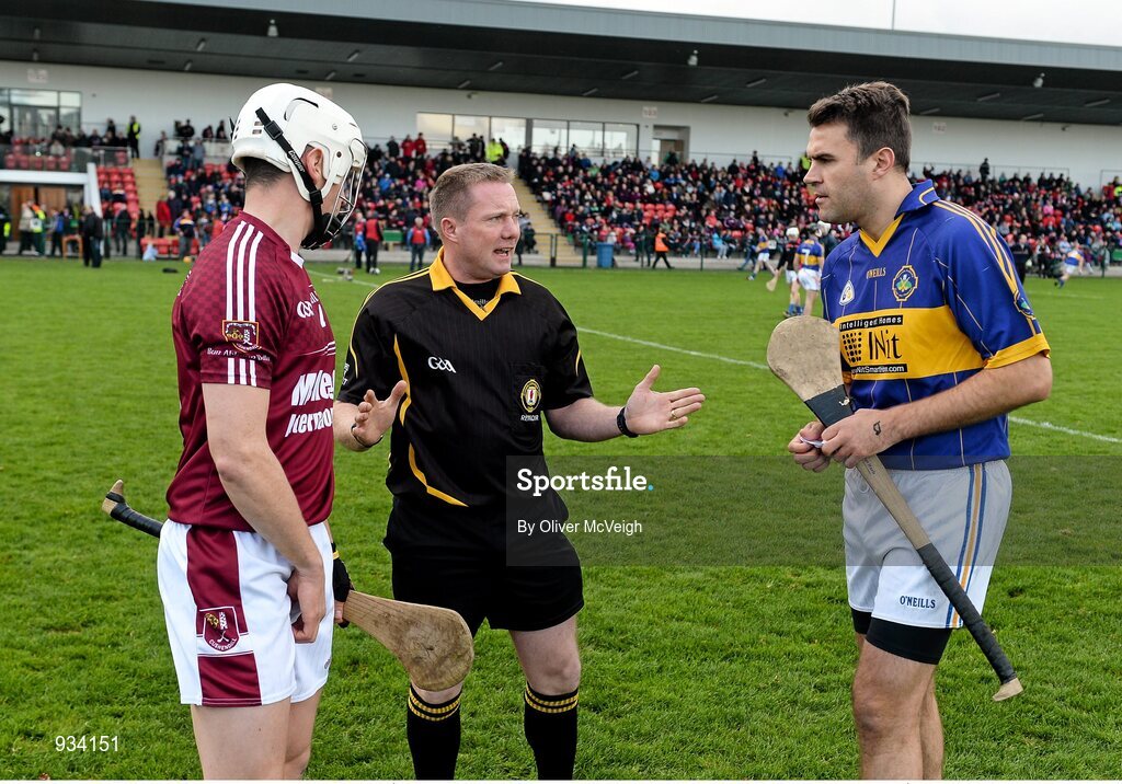2 November 2014; Referee Eamon Hasson along with Aaron Graffin, Cushendall Ruairi Óg Captain  and John Convery, Portaferry Captain at the toss. AIB Ulster GAA Hurling Senior Club Championship Final, Portaferry v Ruairi Óg, Owenbeg Centre of Excellence, Dungiven, Derry. Picture credit: Oliver McVeigh / SPORTSFILE