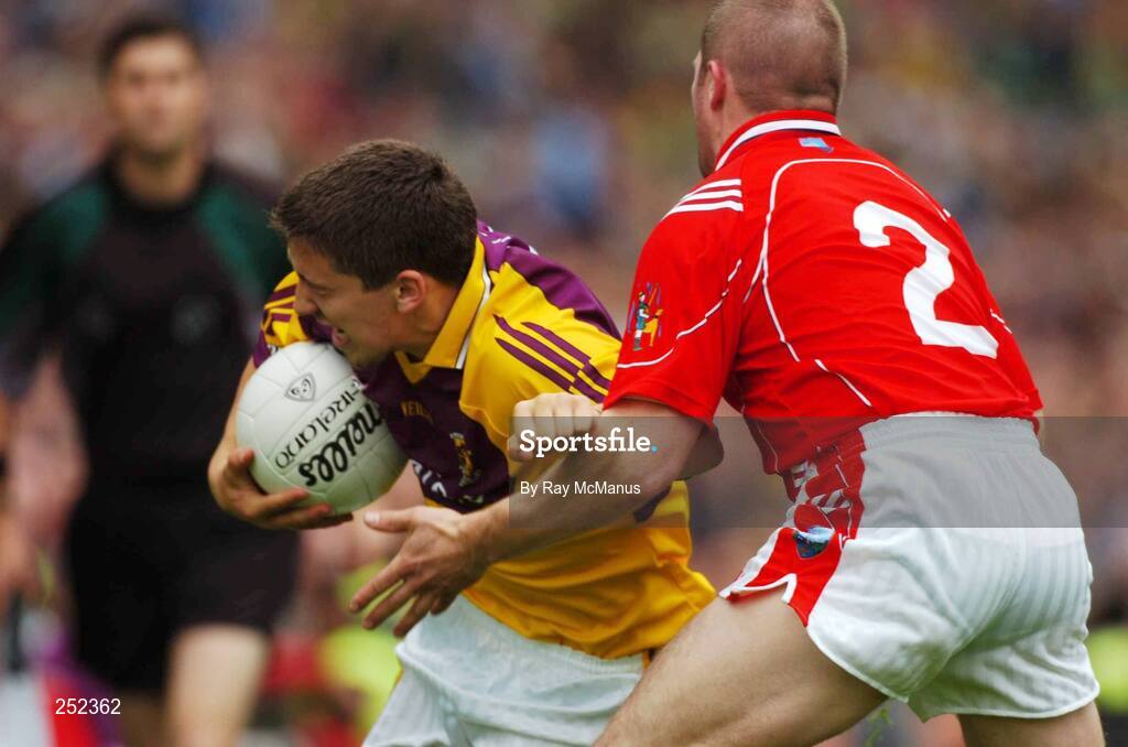 17 June 2007; Ciaran Lyng, Wexford, in action against Alan Page, Louth. Bank of Ireland Leinster Senior Football Championship Quarter-Final, Louth v Wexford, Croke Park, Dublin. Picture credit: Ray McManus / SPORTSFILE