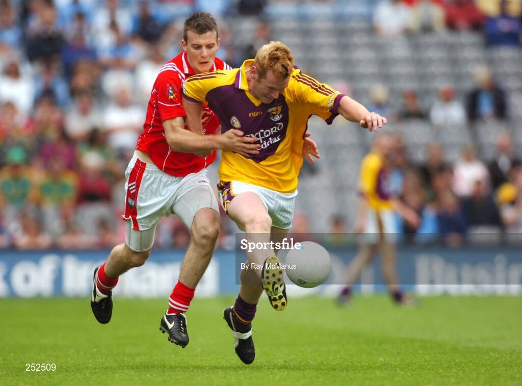 17 June 2007; Eric Bradley, Wexford, in action against Mark Brennan, Louth. Bank of Ireland Leinster Senior Football Championship Quarter-Final, Louth v Wexford, Croke Park, Dublin. Picture credit: Ray McManus / SPORTSFILE
