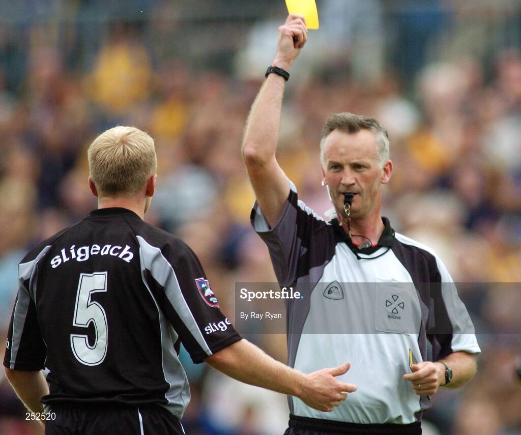 17 June 2007; Sligo's Paul McGovern is shown yellow card by referee James White. Bank of Ireland Connacht Senior Football Championship Semi-Final, Sligo v Roscommon, Dr. Hyde Park, Roscommon. Picture credit: Ray Ryan / SPORTSFILE