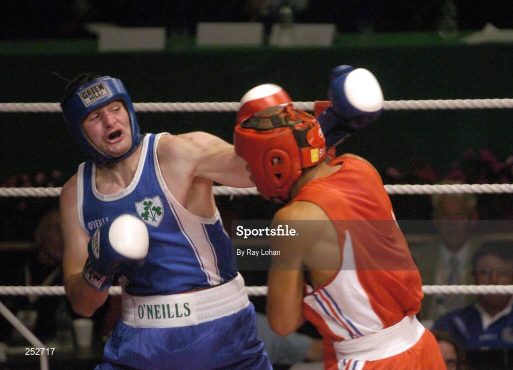 19 June 2006: Ireland’s John Sweeney, left, in action against John-Michael M’bumba, France. 5th European Union Boxing Championships, Heavy Weight 91kg Premliminary Round, John Sweeney, Ireland v John-Michael M’bumba, France, National Stadium, Dublin. Picture credit: Ray Lohan / SPORTSFILE