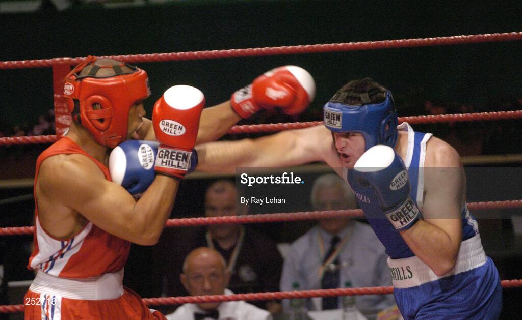19 June 2006: Ireland’s John Sweeney, right, in action against John-Michael M’bumba, France. 5th European Union Boxing Championships, Heavy Weight 91kg Premliminary Round, John Sweeney, Ireland v John-Michael M’bumba, France, National Stadium, Dublin. Picture credit: Ray Lohan / SPORTSFILE