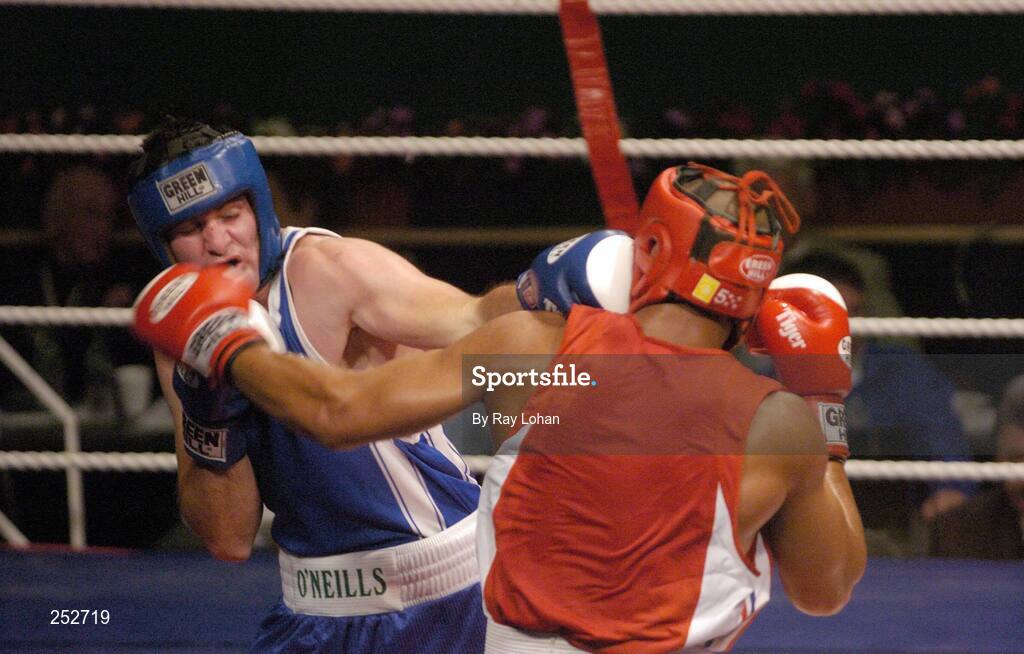 19 June 2006: Ireland’s John Sweeney, left, in action against John-Michael M’bumba, France. 5th European Union Boxing Championships, Heavy Weight 91kg Premliminary Round, John Sweeney, Ireland v John-Michael M’bumba, France, National Stadium, Dublin. Picture credit: Ray Lohan / SPORTSFILE *** Local Caption ***