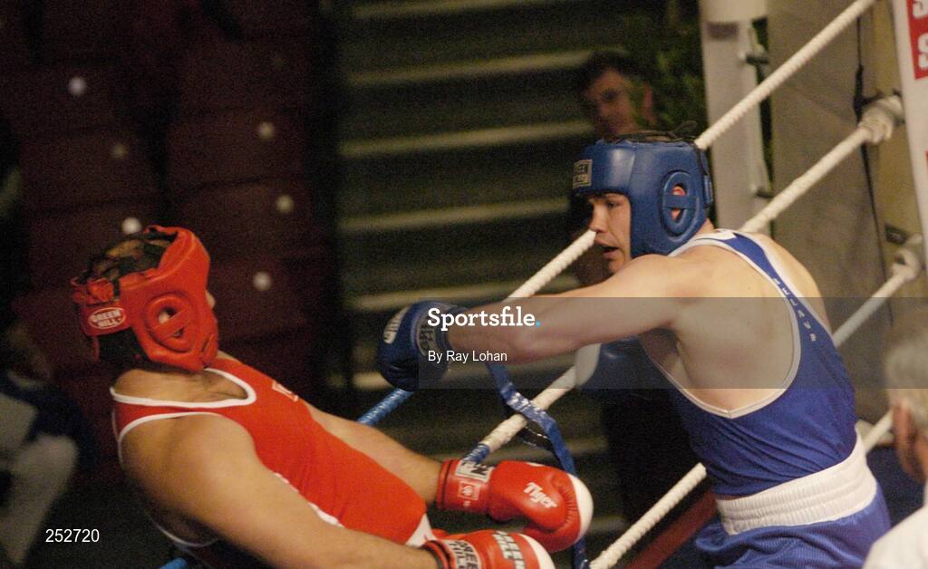 19 June 2006: Ireland’s Cathal MacMonagle, right, in action against Kurban Gunebakan, Turkey. 5th European Union Boxing Championships, Super Heavy Weight +91kg Premliminary Round, Cathal MacMonagle, Ireland v Kurban Gunebakan, Turkey, National Stadium, Dublin. Picture credit: Ray Lohan / SPORTSFILE *** Local Caption ***     INDO ONLY