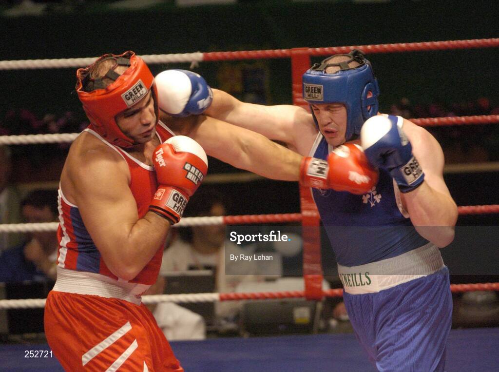 19 June 2006: Ireland’s Cathal MacMonagle, right, in action against Kurban Gunebakan, Turkey. 5th European Union Boxing Championships, Super Heavy Weight +91kg Premliminary Round, Cathal MacMonagle, Ireland v Kurban Gunebakan, Turkey, National Stadium, Dublin. Picture credit: Ray Lohan / SPORTSFILE *** Local Caption ***