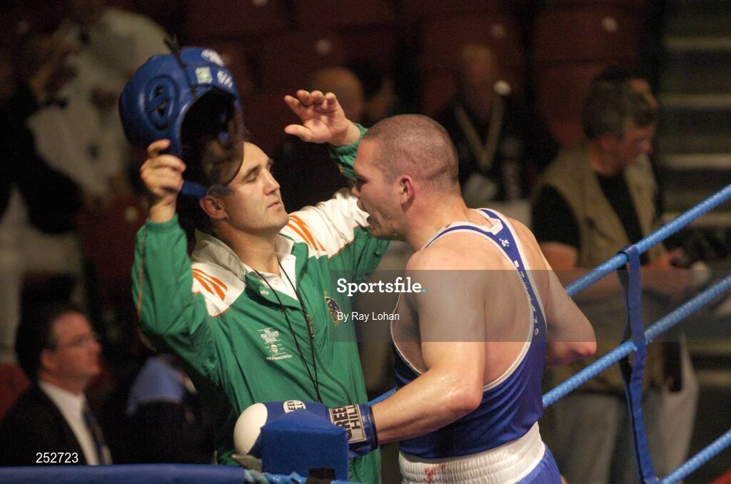 19 June 2006: Ireland head coach Billy Walsh and Cathal MacMonagle, after defeating Kurban Gunebakan, Turkey. 5th European Union Boxing Championships, Super Heavy Weight +91kg Premliminary Round, Cathal MacMonagle, Ireland v Kurban Gunebakan, Turkey, National Stadium, Dublin. Picture credit: Ray Lohan / SPORTSFILE *** Local Caption ***