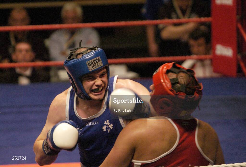 19 June 2006: Ireland’s Cathal MacMonagle, Blue, in action against Kurban Gunebakan, Turkey. 5th European Union Boxing Championships, Super Heavy Weight +91kg Premliminary Round, Cathal MacMonagle, Ireland v Kurban Gunebakan, Turkey, National Stadium, Dublin. Picture credit: Ray Lohan / SPORTSFILE