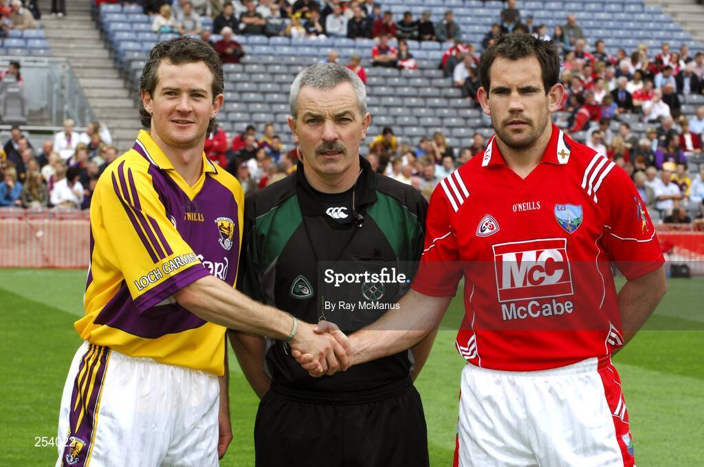 17 June 2007;  Wexford captain Ciaran Lyng with referee Paddy Russell and Louth captain Peter McGinnity before the 'toss'. Bank of Ireland Leinster Senior Football Championship Quarter-Final, Louth v Wexford, Croke Park, Dublin. Picture credit: Ray McManus / SPORTSFILE