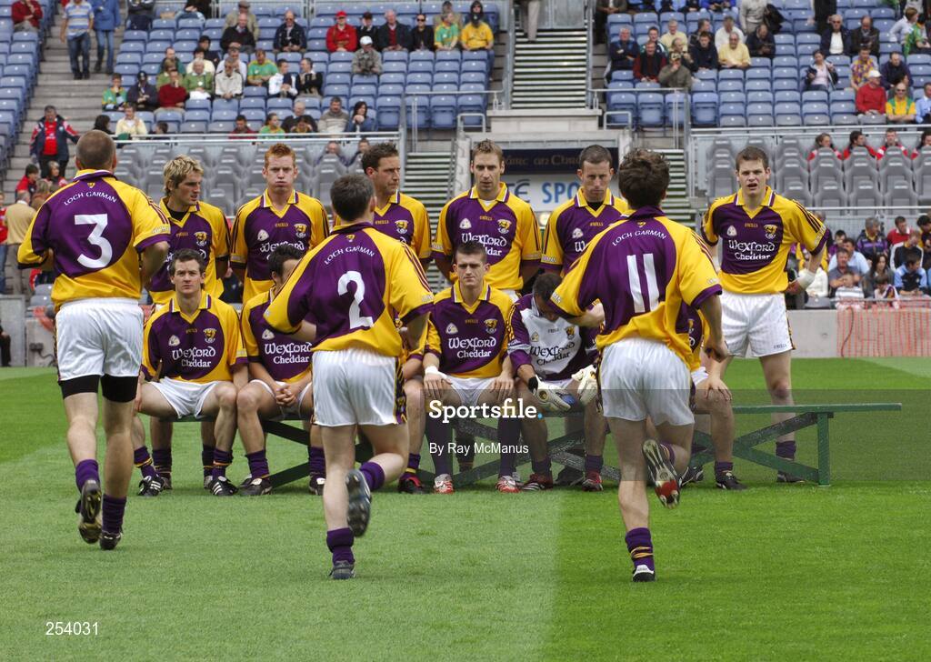 17 June 2007; Philip Wallace, 3, Colm Morris, 2, and Redmond Barry make their way to join their Wexford team-mates for the team photograph. Bank of Ireland Leinster Senior Football Championship Quarter-Final, Louth v Wexford, Croke Park, Dublin. Picture credit: Ray McManus / SPORTSFILE